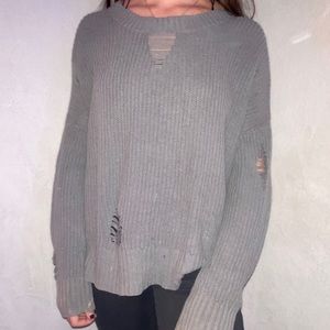 Distressed knit sweater